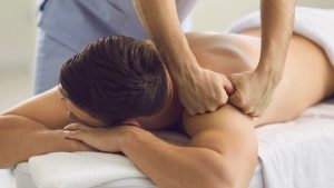 How does a full body massage help in reducing stress and muscle pain